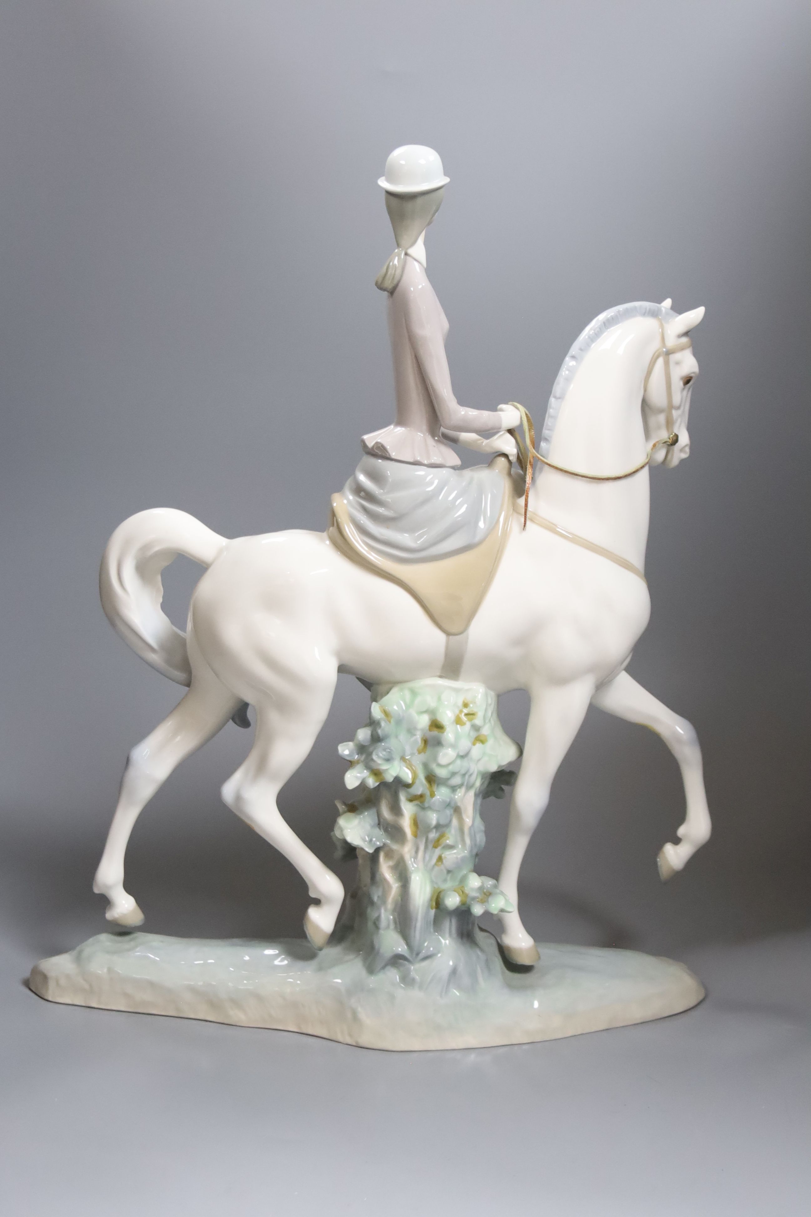 A Lladro equestrian figure, 'Woman on Horse', no. 4516, height 45cm